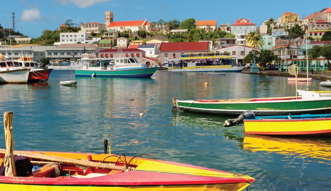 Bright yellow boats in a harbour in Grenada