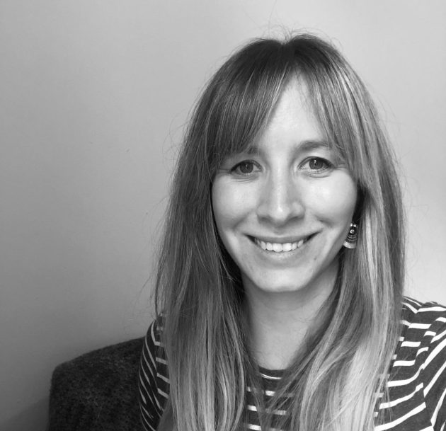 Profile photo of Sarah Duffy, Head of Education at Common Seas. Sarah wears a striped long-sleeved top and smiles at the camera. The photo is in greyscale.